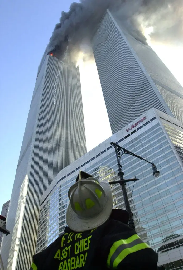 Assistant Chief Gerard A. Barbara was an incident commander at 911, and shortly after this picture was taken he would enter the towers (David Handschuh/NY Daily News Archive via Getty Images)