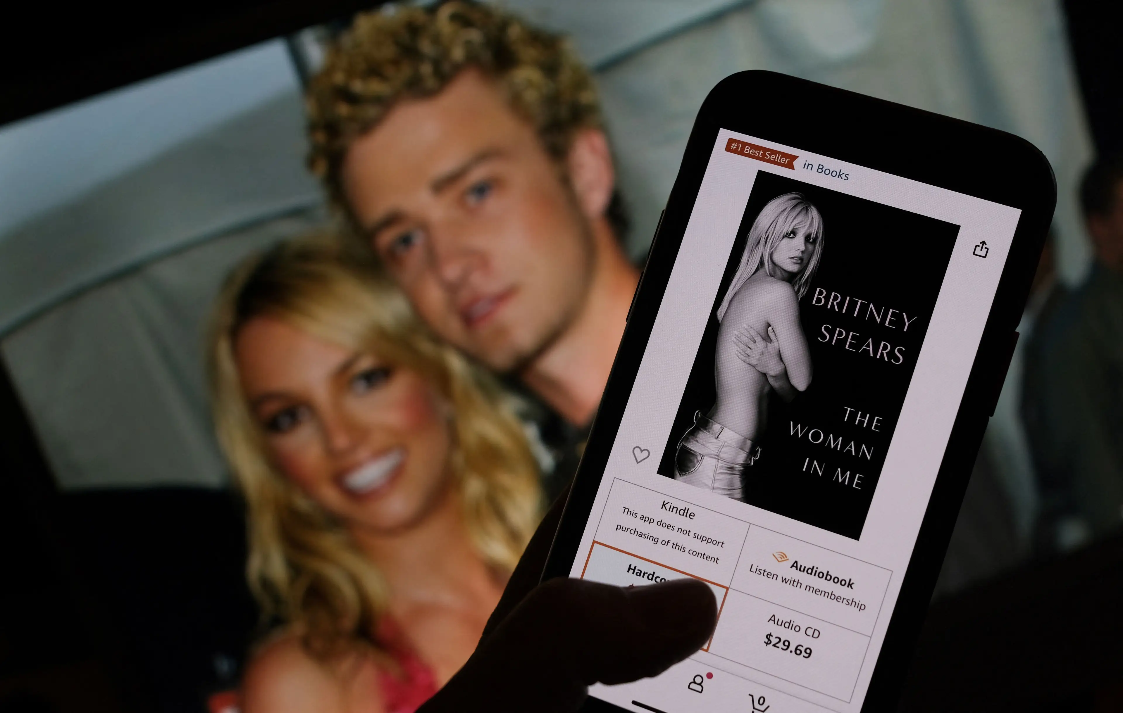 In her memoir, The Woman in Me, Britney Spears explained how she wasn't like the image her publicists tried to force her into (CHRIS DELMAS/AFP via Getty Images)