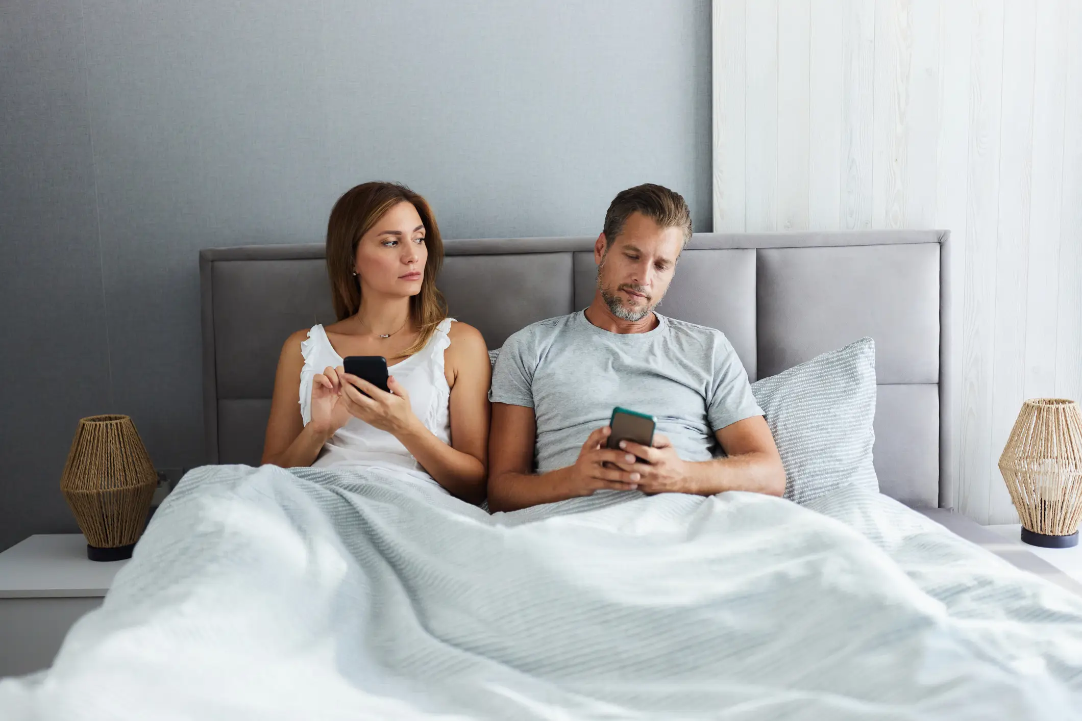 Digital cheating breaks a partner's trust through secrecy and emotional or sexual betrayal (Getty Stock Images)