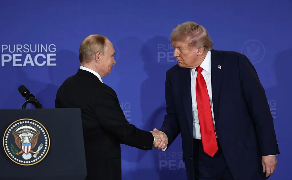Donald Trump and Vladimir Putin's meeting seems to have produced more questions than answers (Kremlin Press Office/Anadolu via Getty Images)