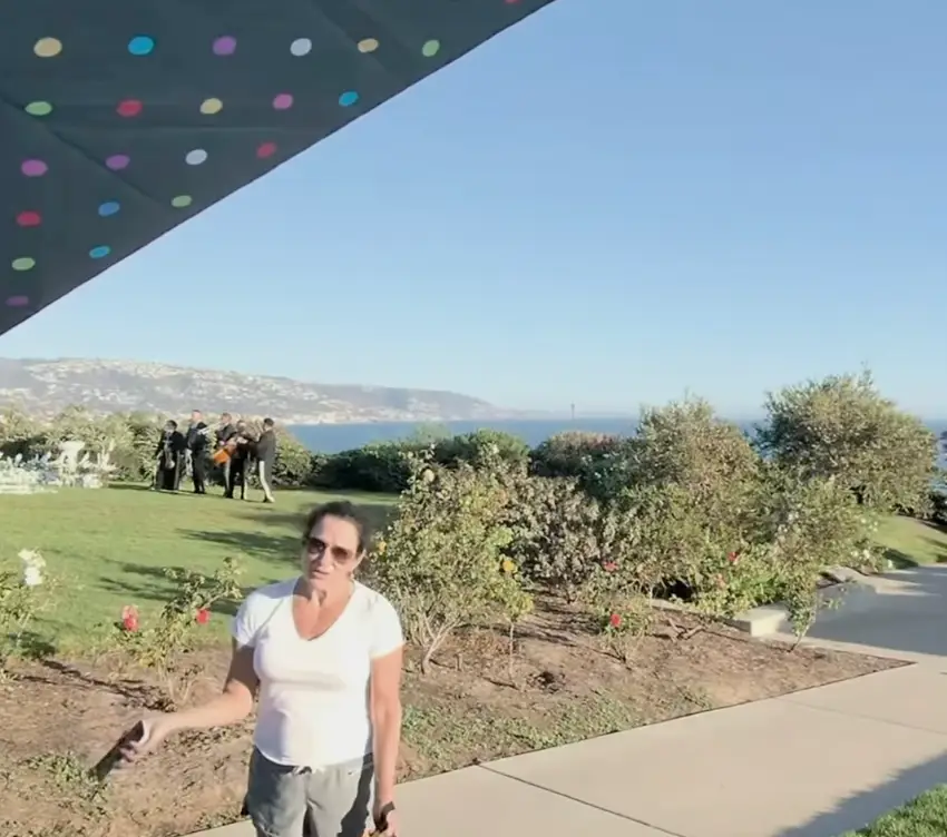 The woman approached Trinity as she was waiting to film the event (trinityfilmsofficial/Instagram)