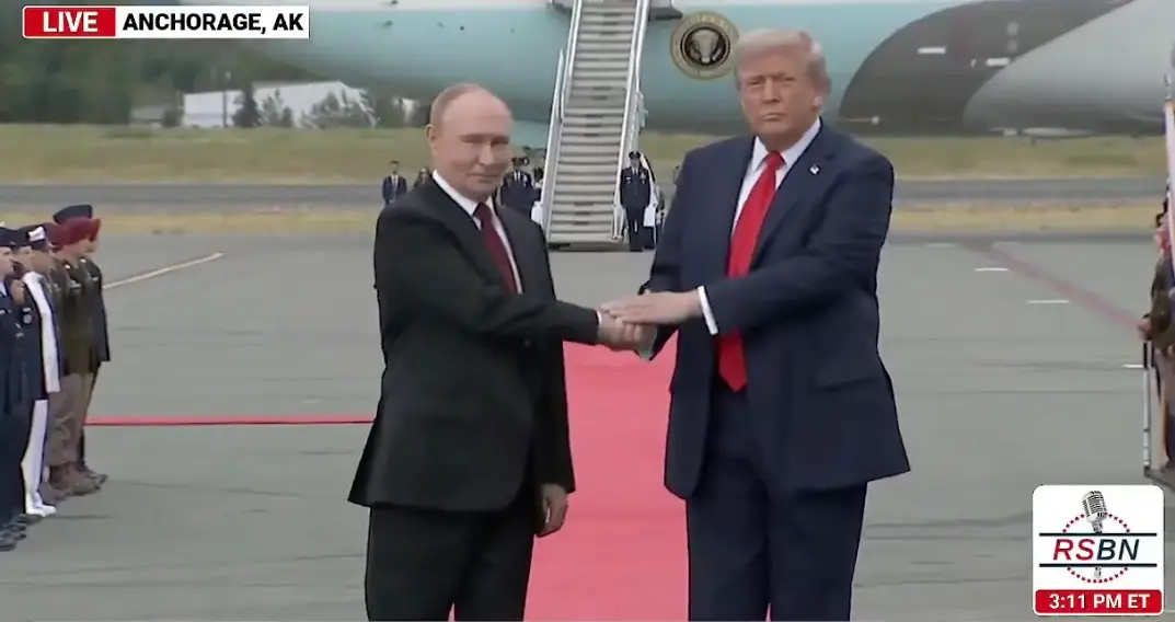 The world leaders handshake has sparked a lot of chatter online (RSBN)