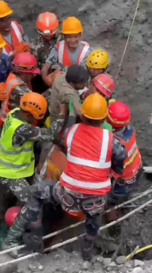 Heartwarming footage captured the rescue of the two workers (Nepal Electricity Authority)