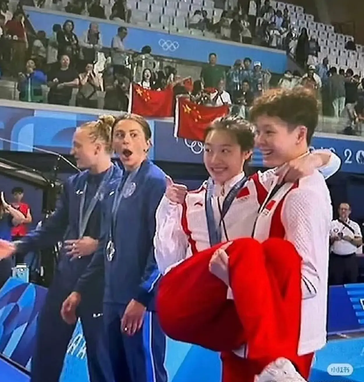 Kassidy Cook's reaction to the gold medal winners' celebration has gone viral for obvious reasons (X)