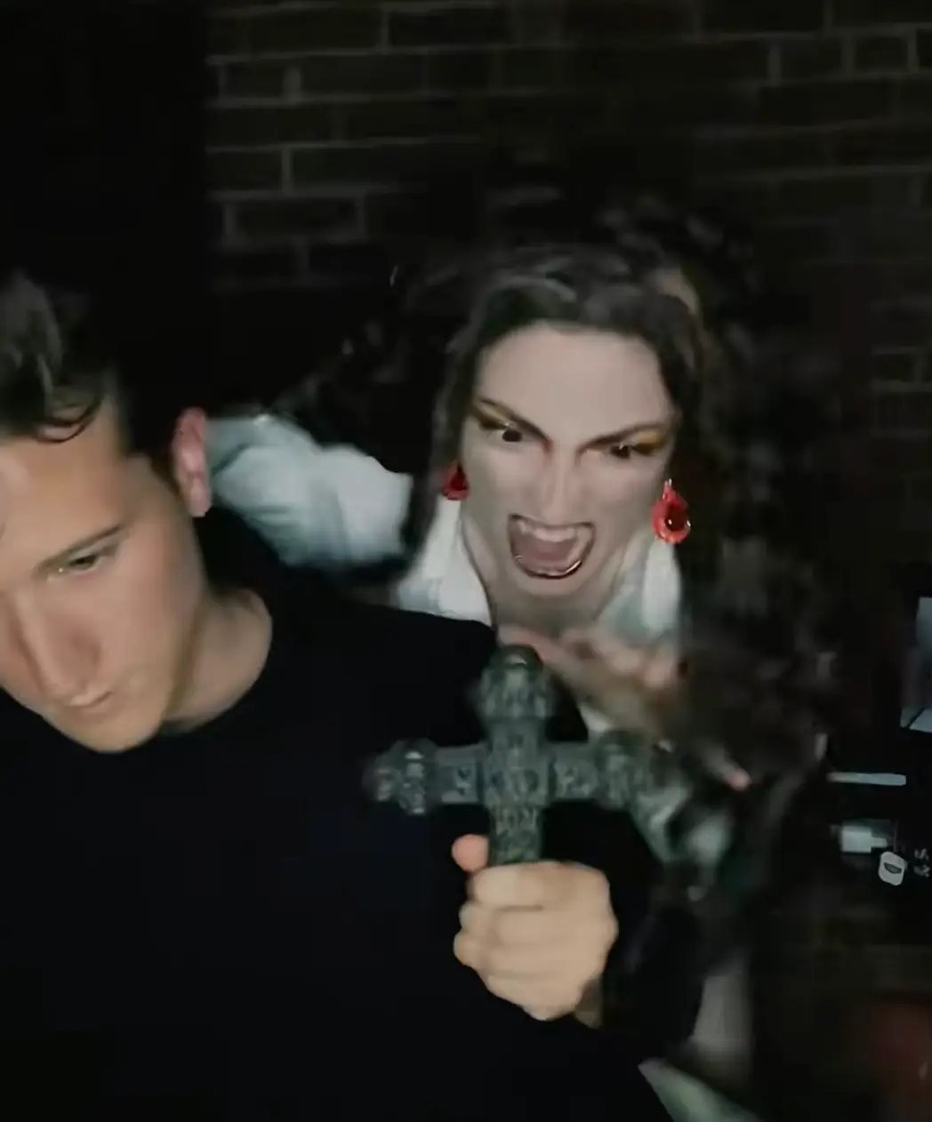 Although Hellie says vampire stereotypes are made up in the movies, she does play into them in her TikTok videos (TikTok/@thevampirehellie)