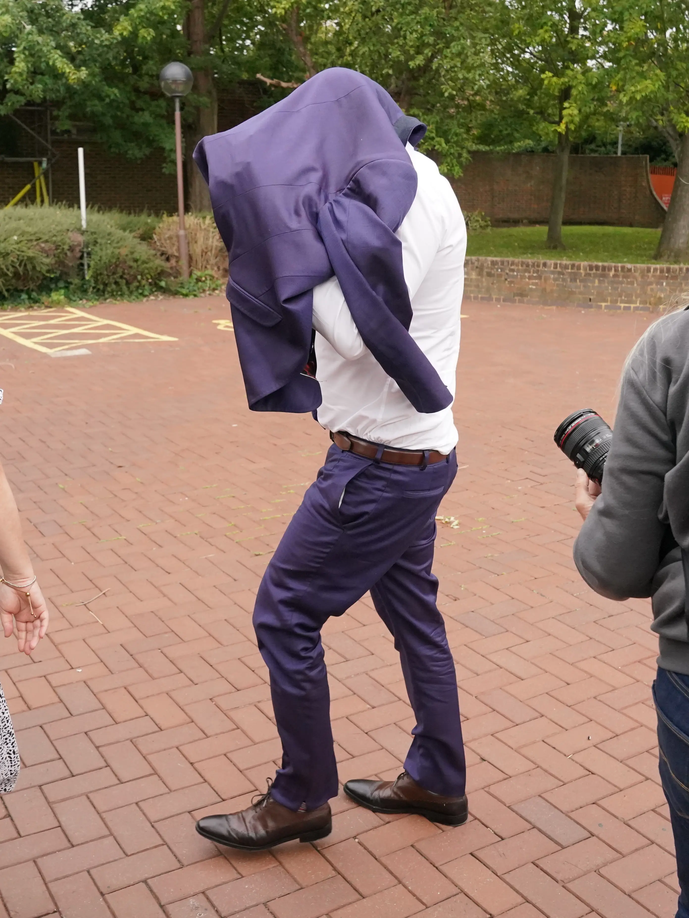 Blue singer Lee Ryan has been given a 12-month suspended prison sentence for racially aggravated common assault.