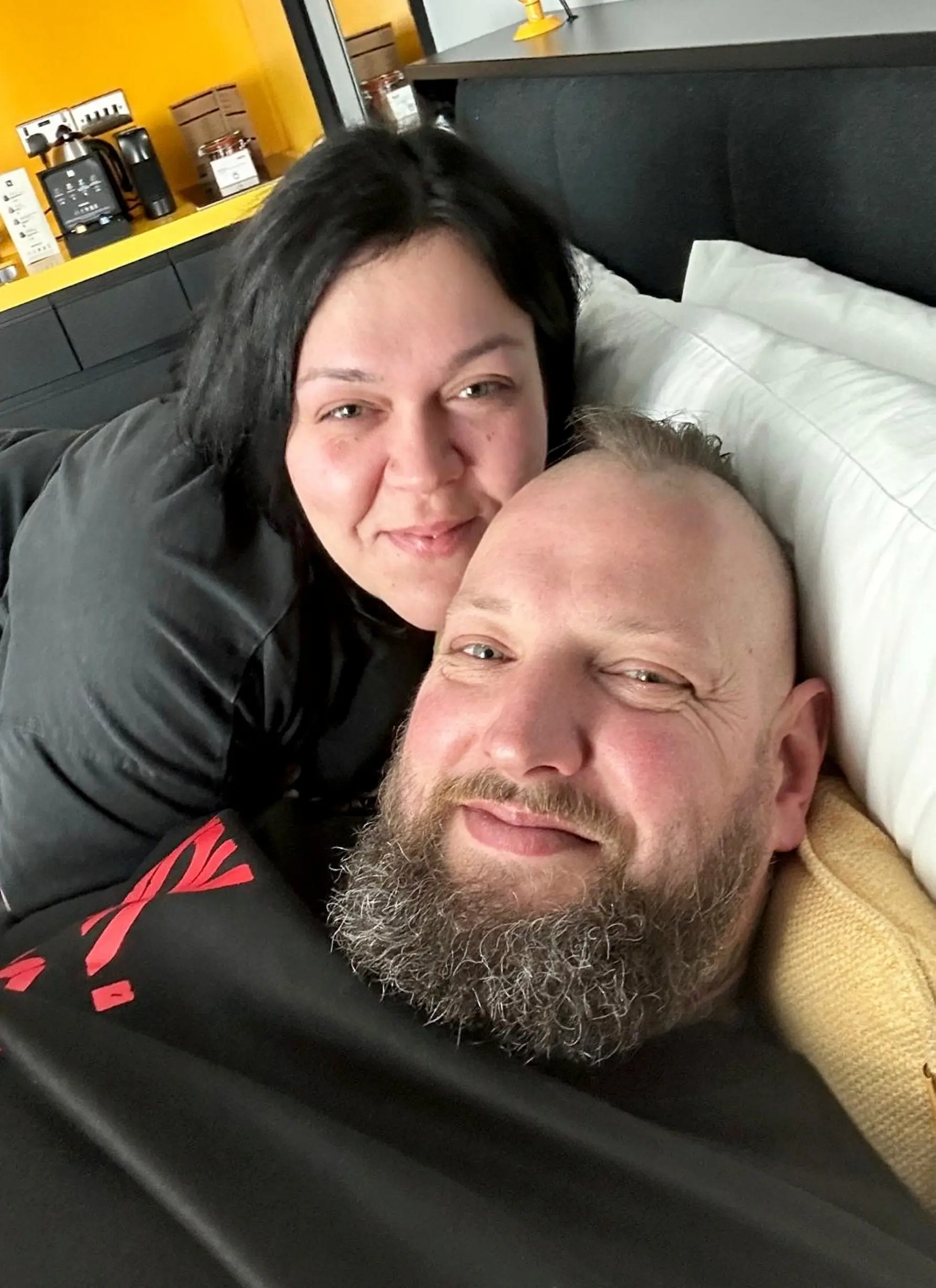 Kev Coles (right) with his wife Kayleigh (SWNS)