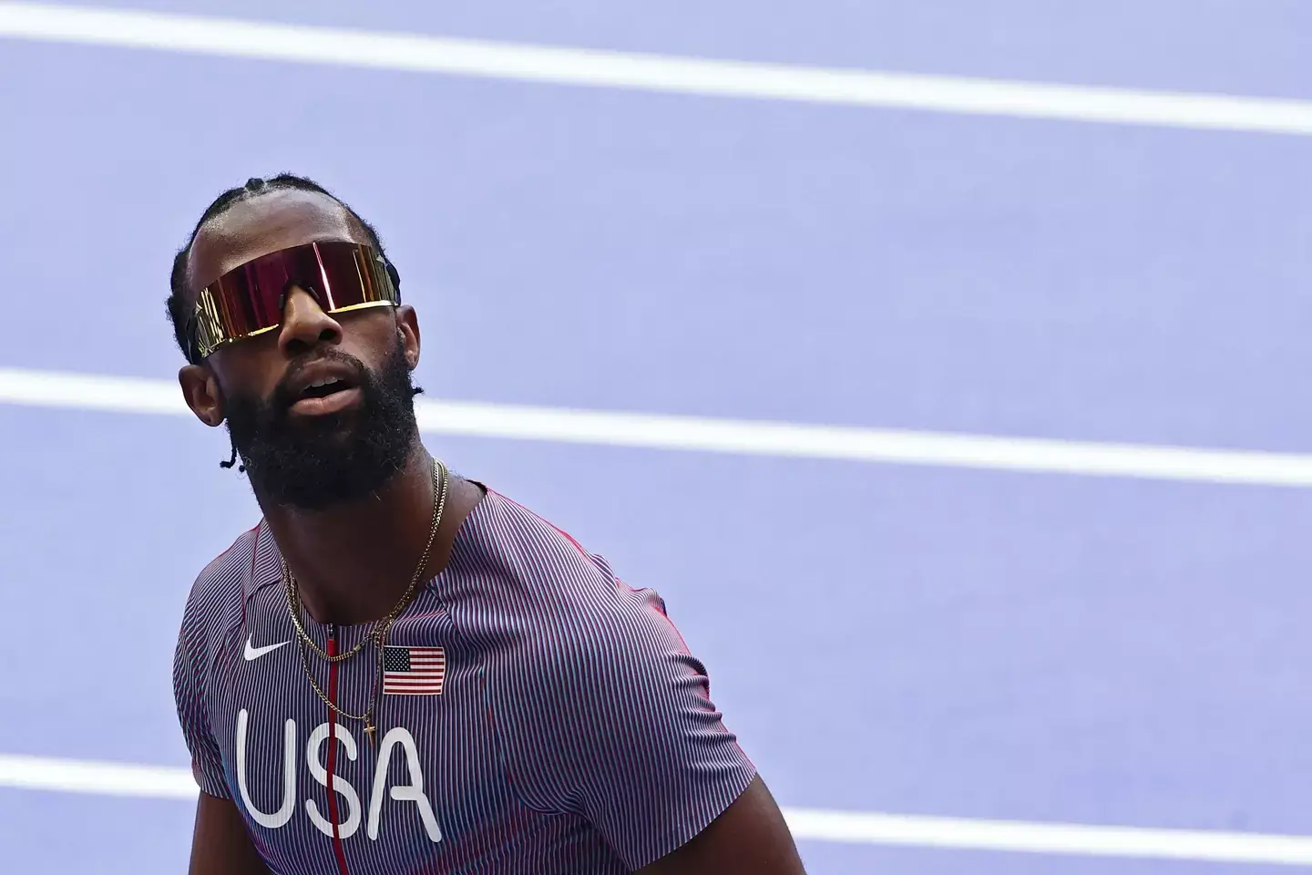 The Team USA star purposely jogged through the 110m hurdles to save himself for the repechage rounds (ANNE-CHRISTINE POUJOULAT/AFP via Getty Images)