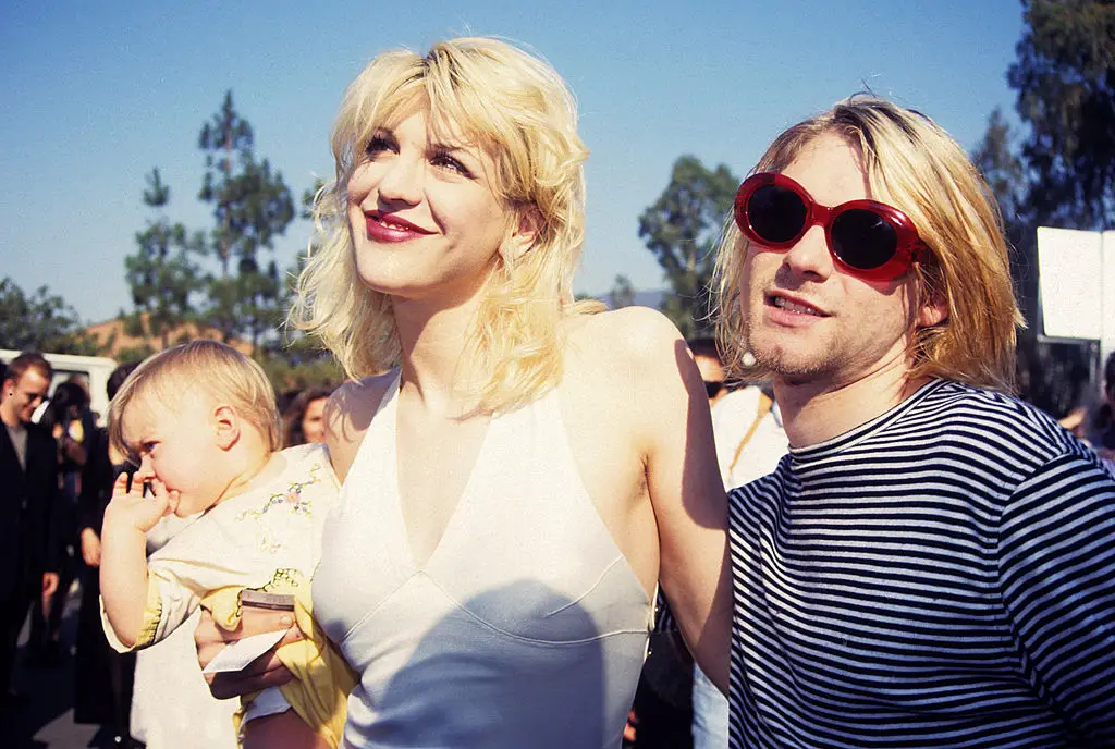 Love and Cobain soon became parents but it didn't stop their chaotic lifestyle (Photo by Terry McGinnis/WireImage/Getty)