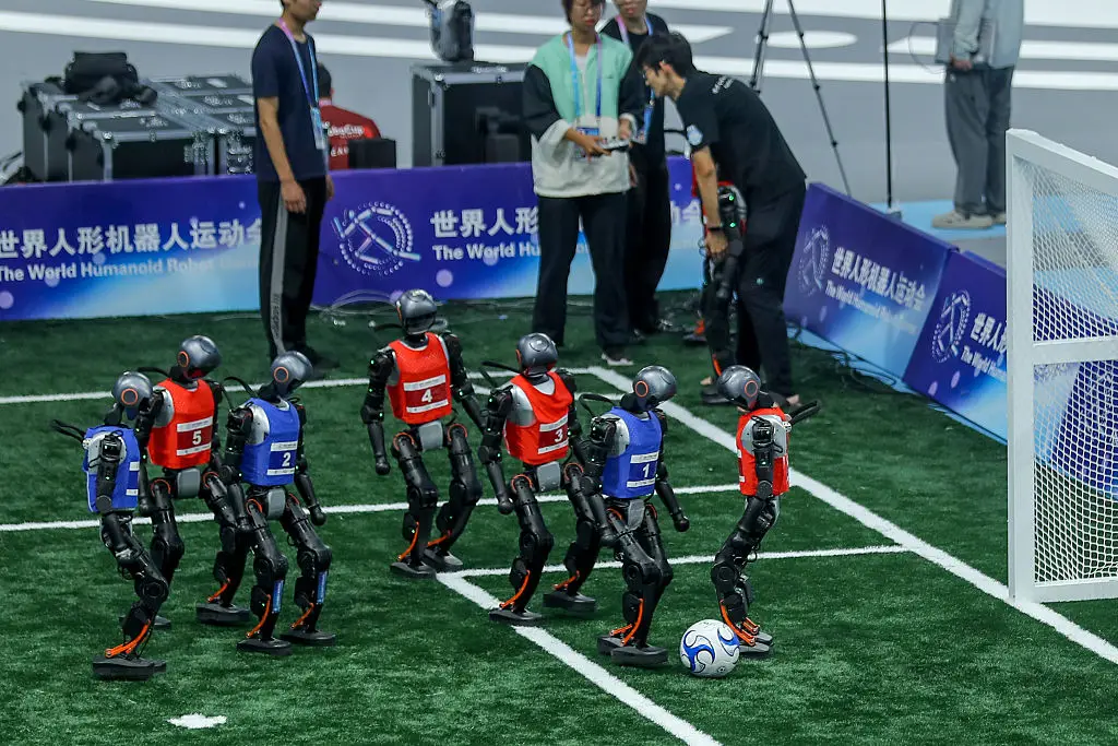 Chaos in the penalty box (Xu Jiming/VCG via Getty Images)