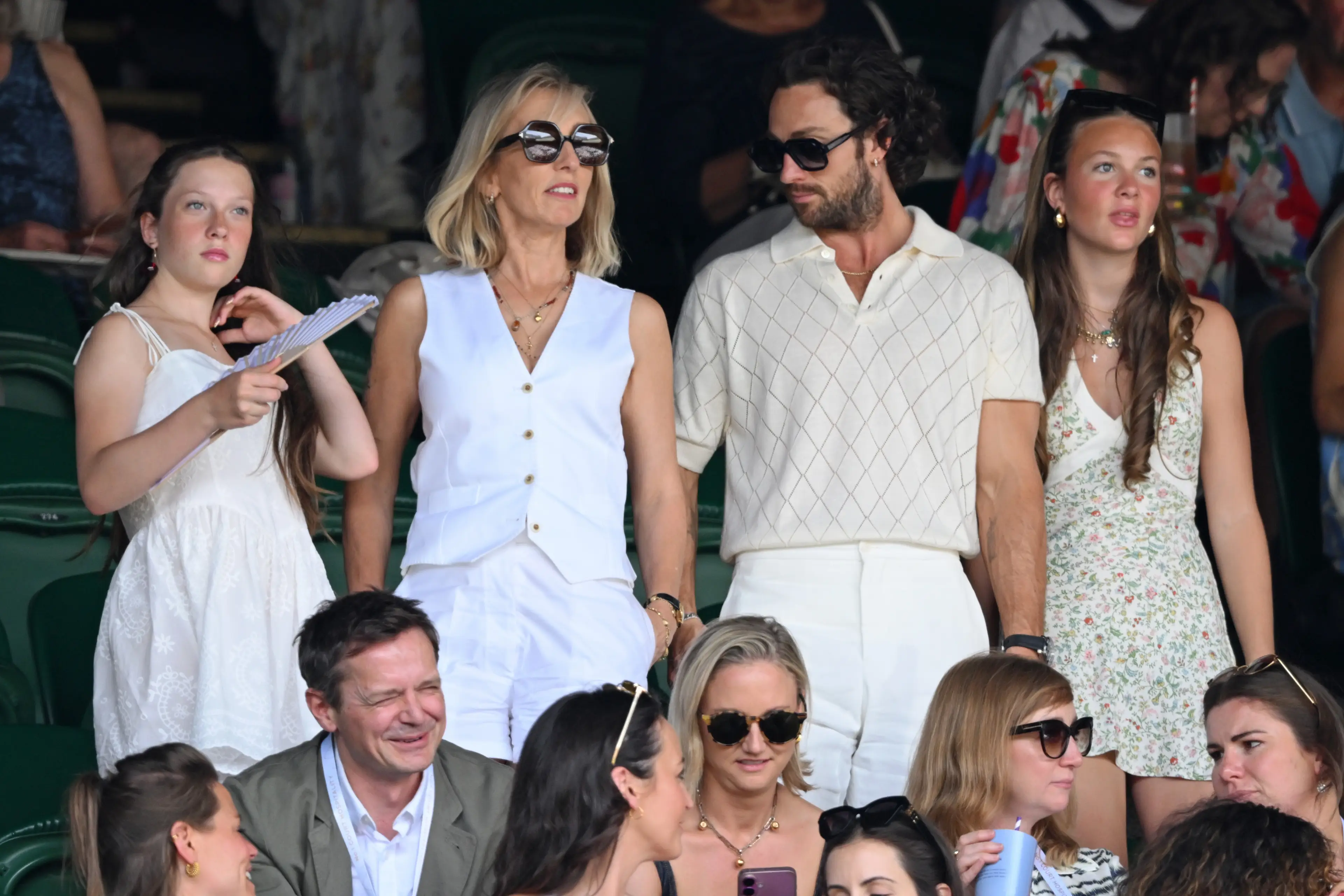 Aaron and Sam were flanked by their two daughters (Karwai Tang/WireImage)