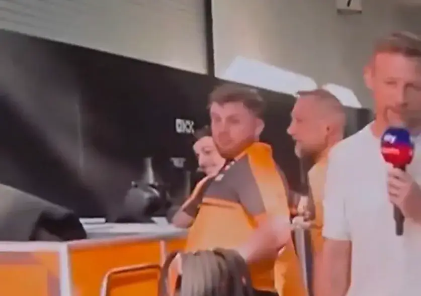 An F1 member of staff was also caught looking while she walked past (Sky Sports)