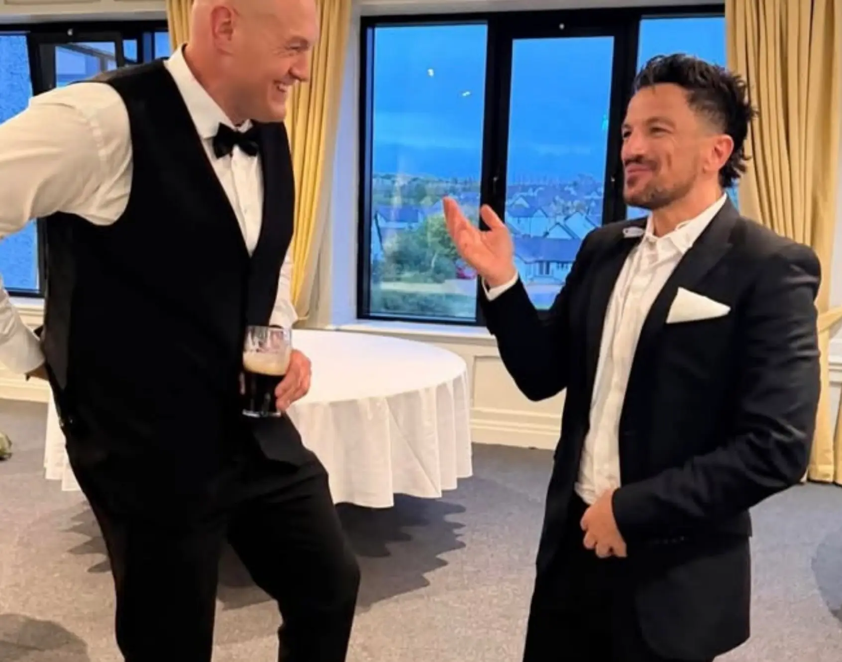 Tyson Fury shared some snaps of him and Peter Andre having a chat at his daughter's wedding bash (Instagram/@tysonfury)