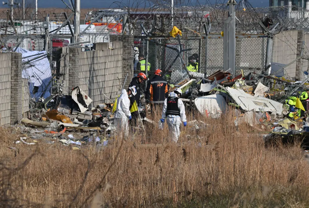 Authorities are still searching for bodies and parts of the aircraft (JUNG YEON-JE/AFP via Getty Images)