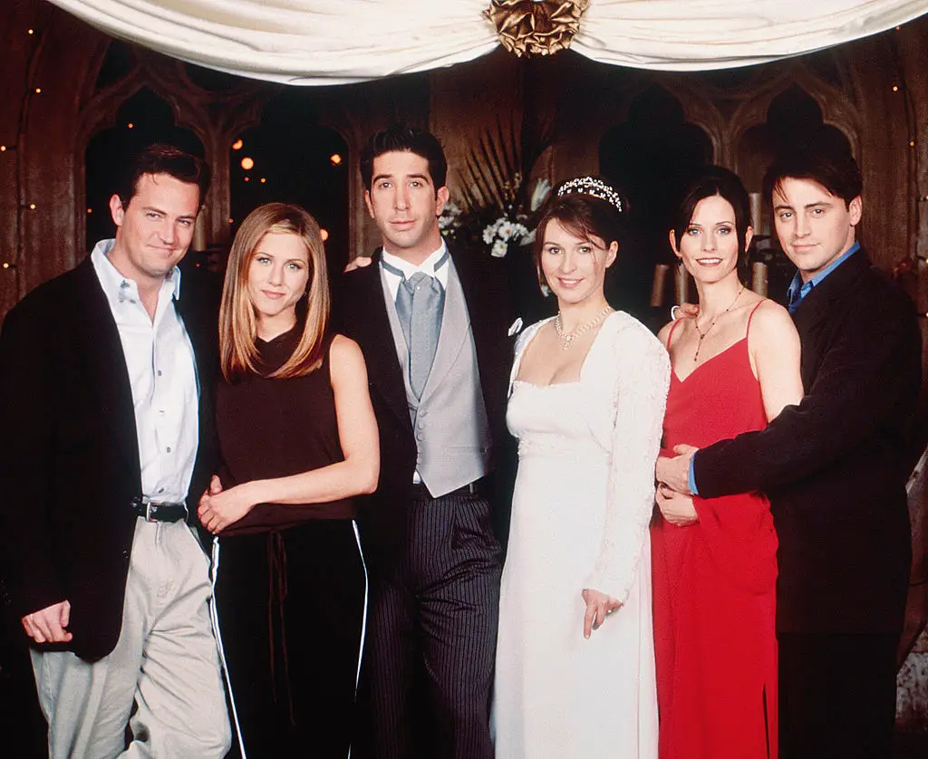 Helen Baxendale (the one in the middle that's not David Schwimmer) said she really enjoyed her time on Friends, but the fame made it hard to live a normal life. (Oliver Upton/NBCU Photo Bank/NBCUniversal via Getty Images)