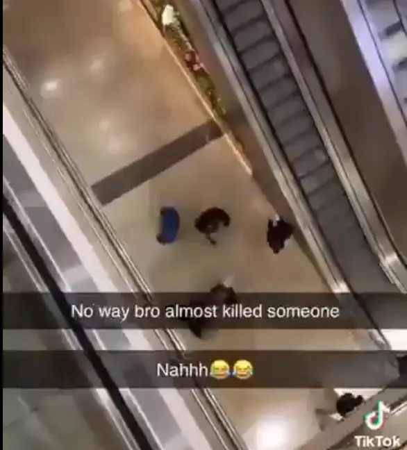 The chair landed close to where shoppers were walking on the ground floor (X)