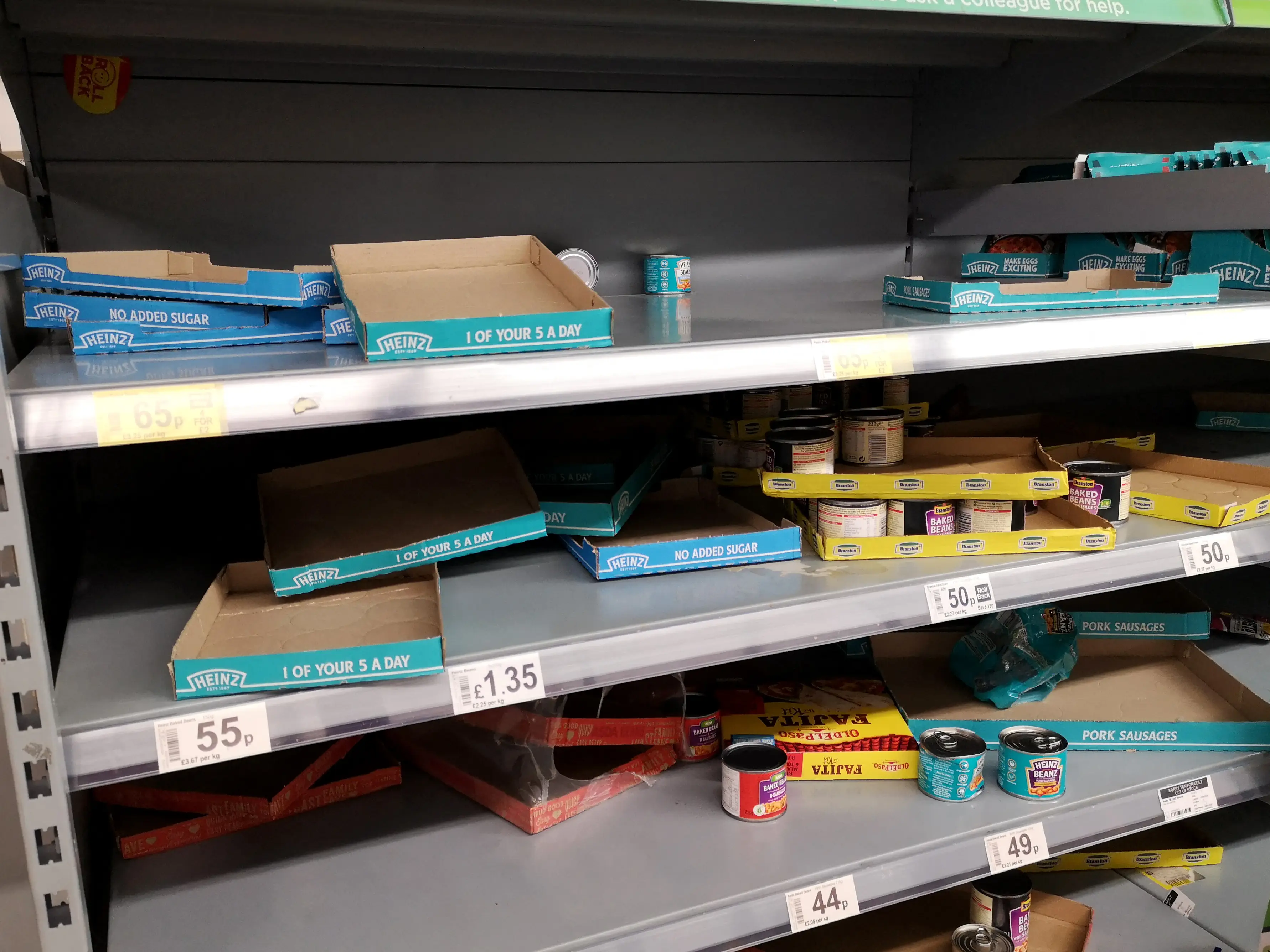 Tinned food has been flying off the shelves (Justin TALLIS / AFP via Getty Images)