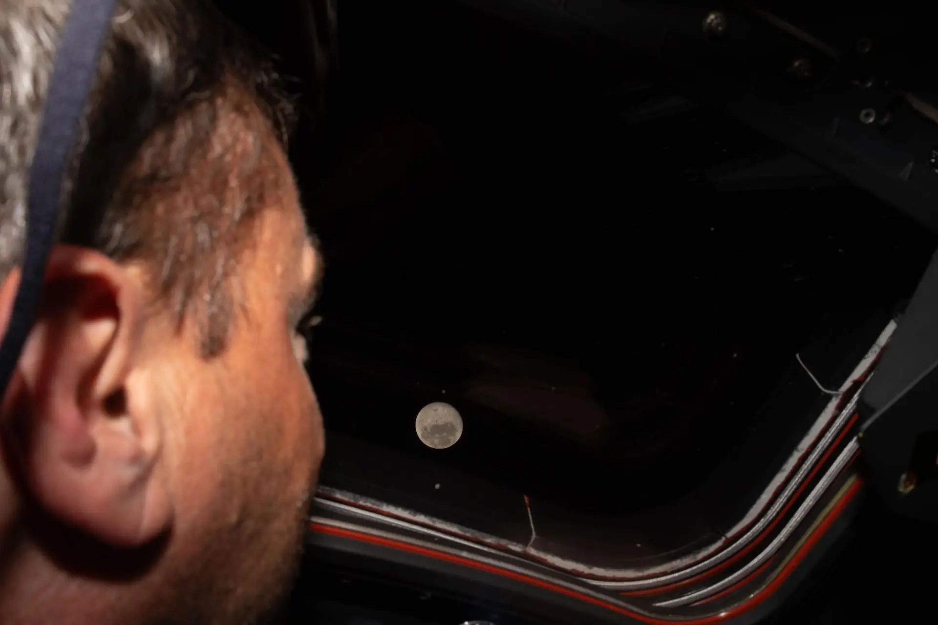 Artemis II commander and NASA astronaut Reid Wiseman is seen taking in the view (NASA)