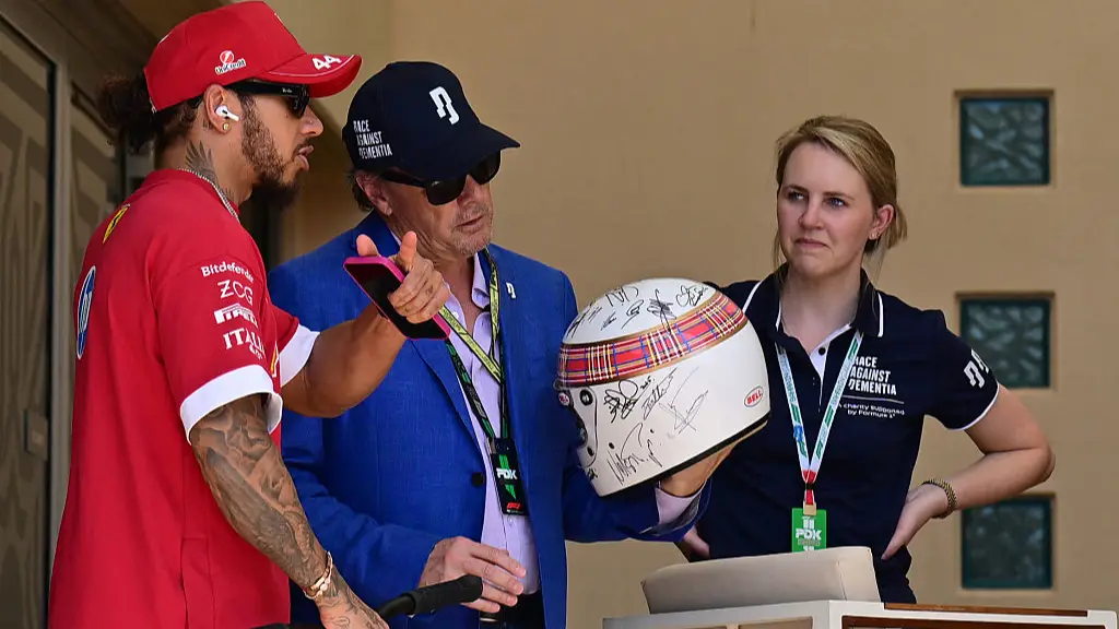 Michael Schumacher signs charity helmet in rare public act following tragic skiing accident