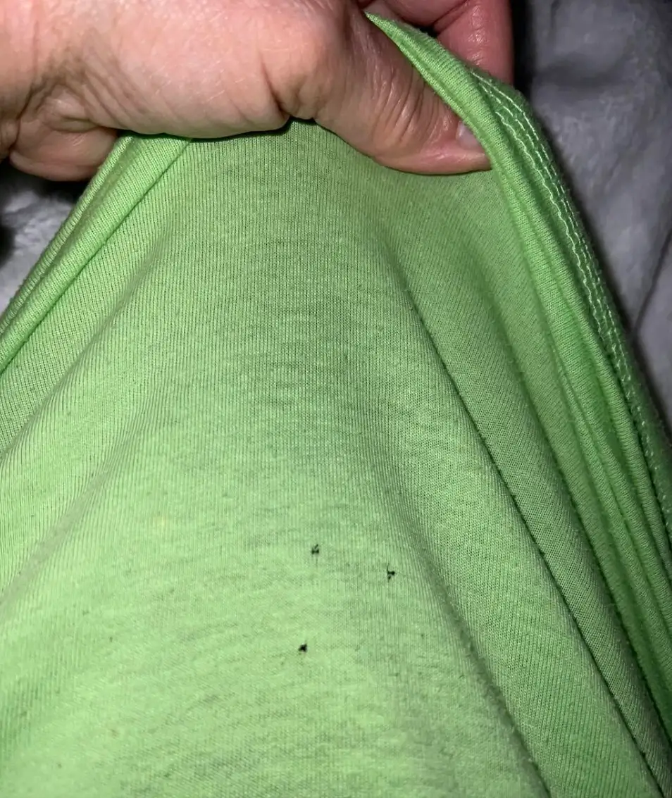 The same holes were on loads of his t-shirts in the same place, the bloke said (Facebook)