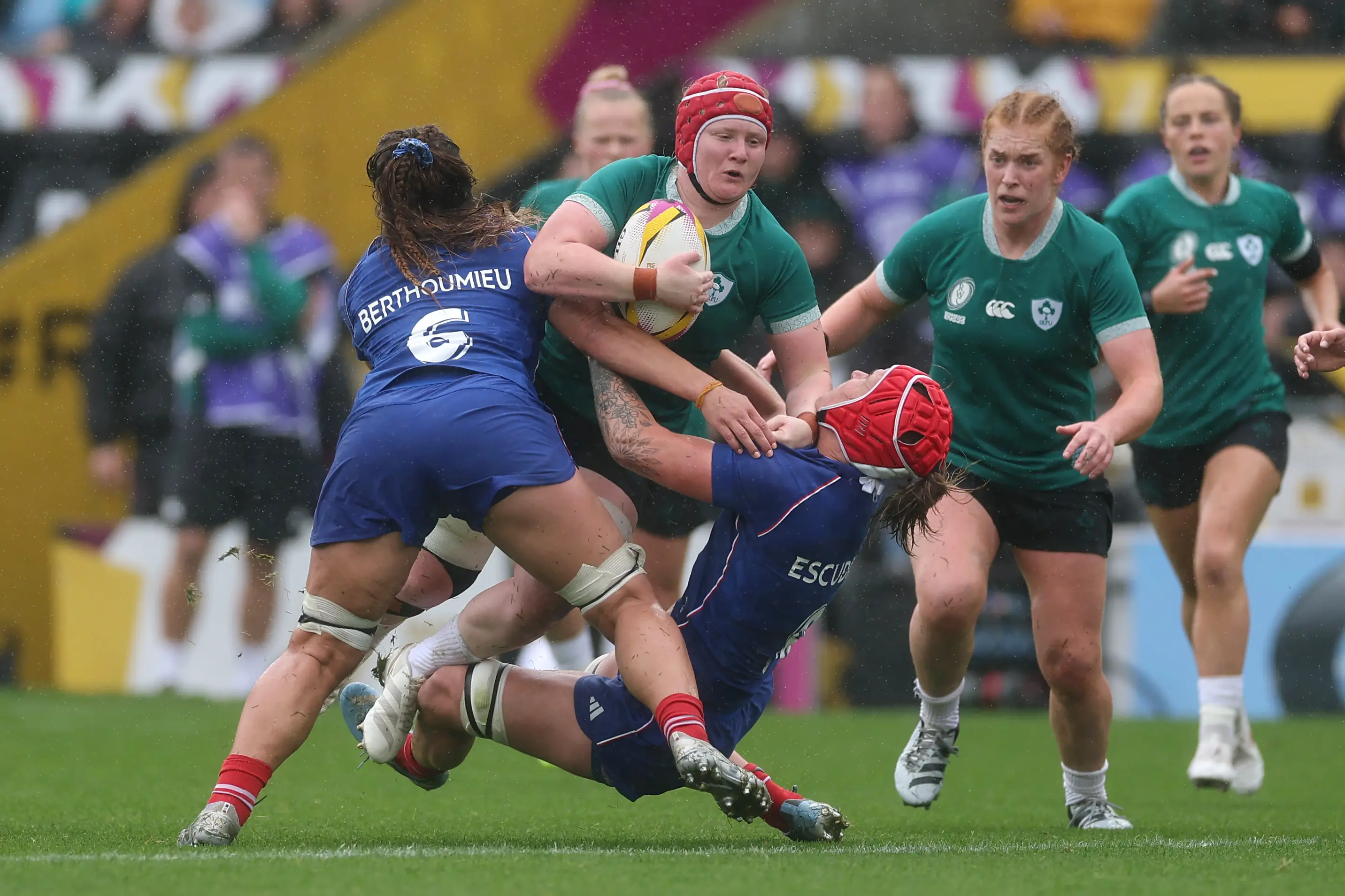 Aoife Wafer pictured being tackled by Axelle Berthoumieu and Charlotte Escudero during the game (Alex Davidson - World Rugby/World Rugby via Getty Images)