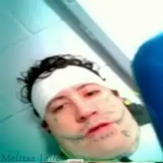 New images of the 'Deadpool killer' have emerged (Lee County Jail/YouTube/Melissa Jade)