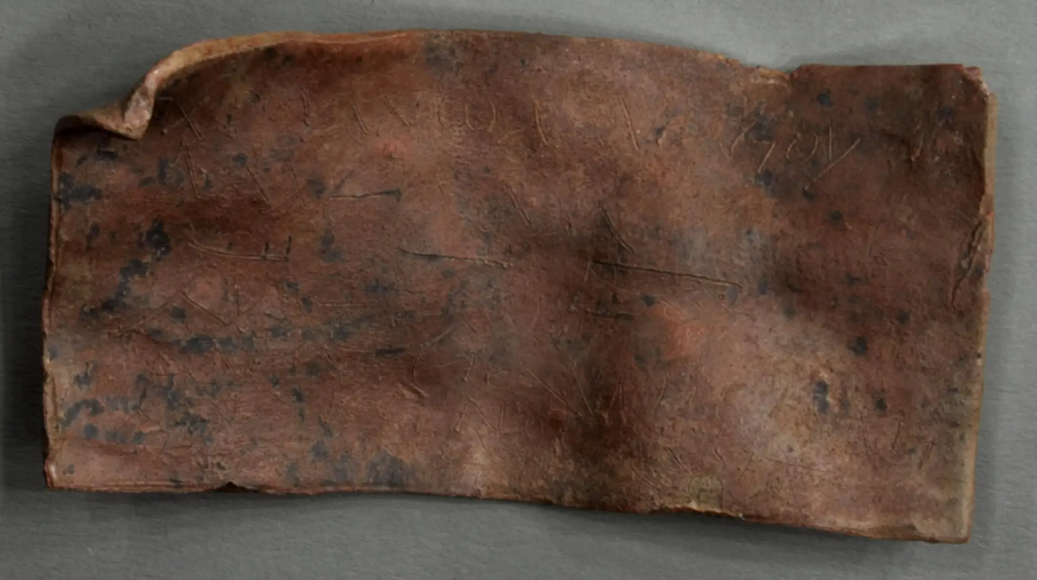 This lump of lead was used to curse people during the Roman Empire (Heidelberg University's Institute of Papyrology) 