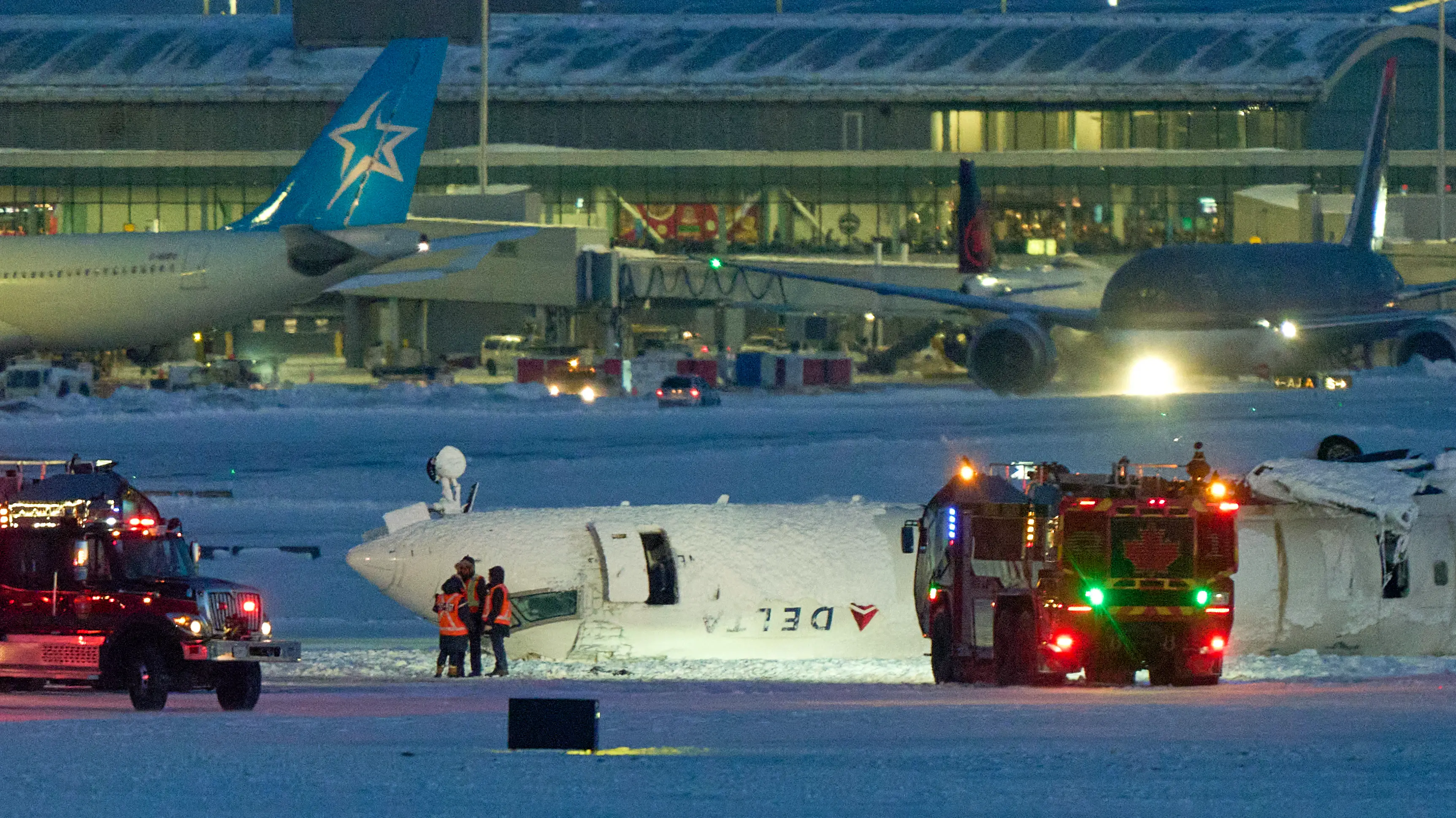 Chilling audio from Delta plane crash reveals moment air traffic control was told it was 'upside down and burning'