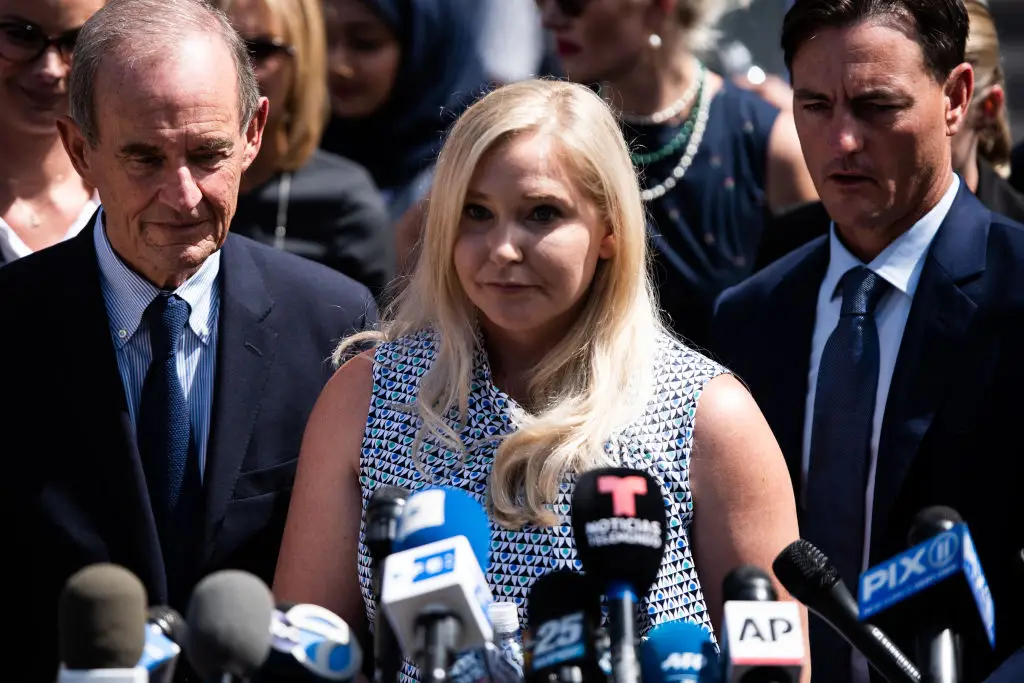 Virginia speaking outside US federal court in 2019 (Bloomberg/Getty)
