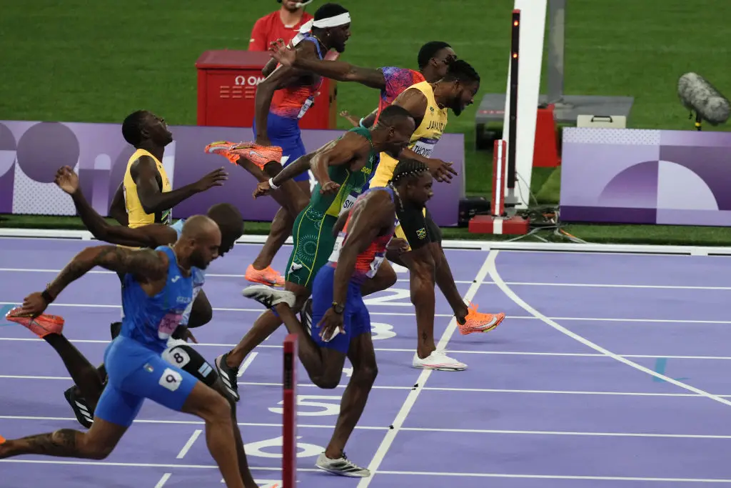 Noah Lyles won it by a hair. (DIMITAR DILKOFF/AFP via Getty Images)