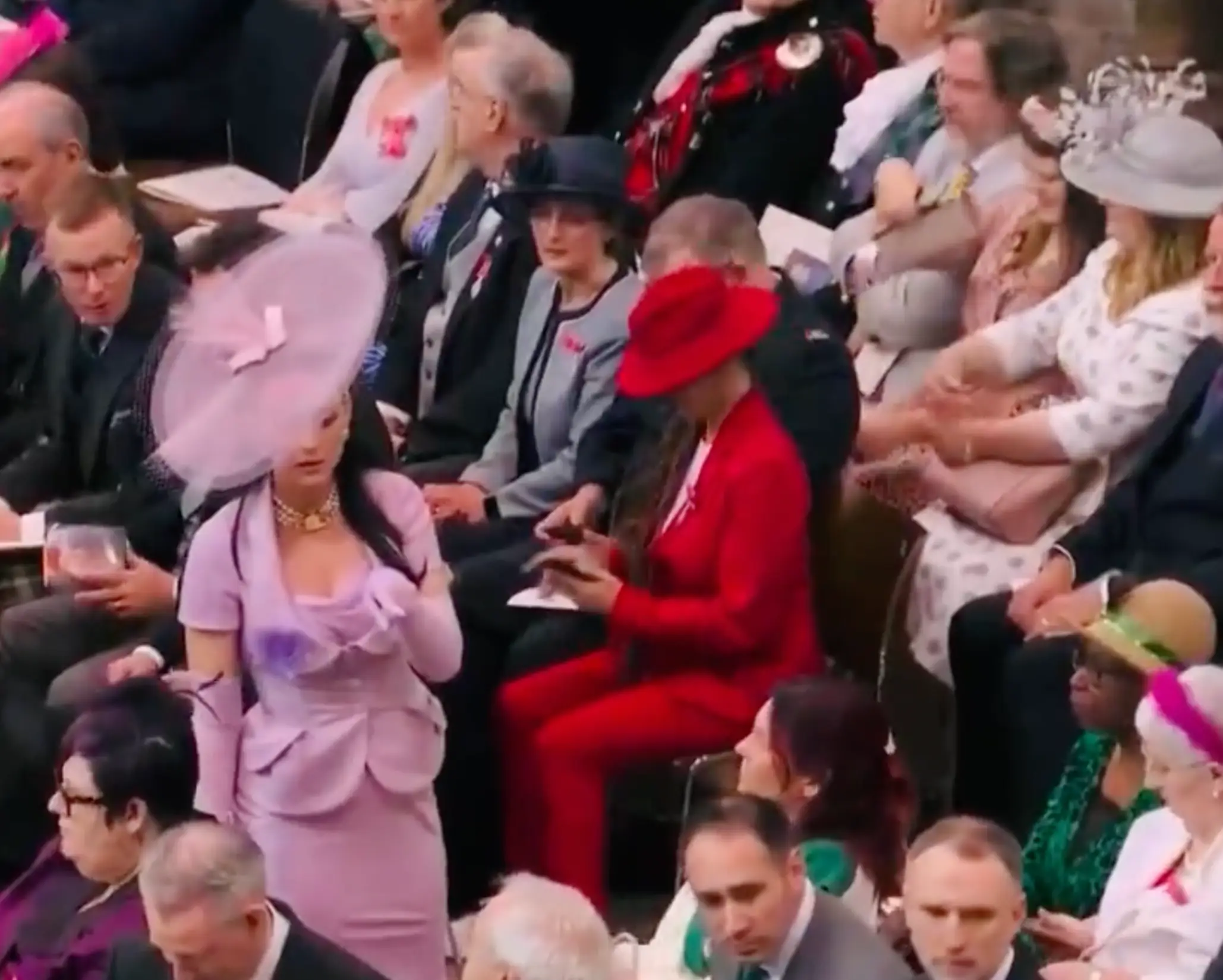 "How can she find her seat when she has fishing net over her head?"