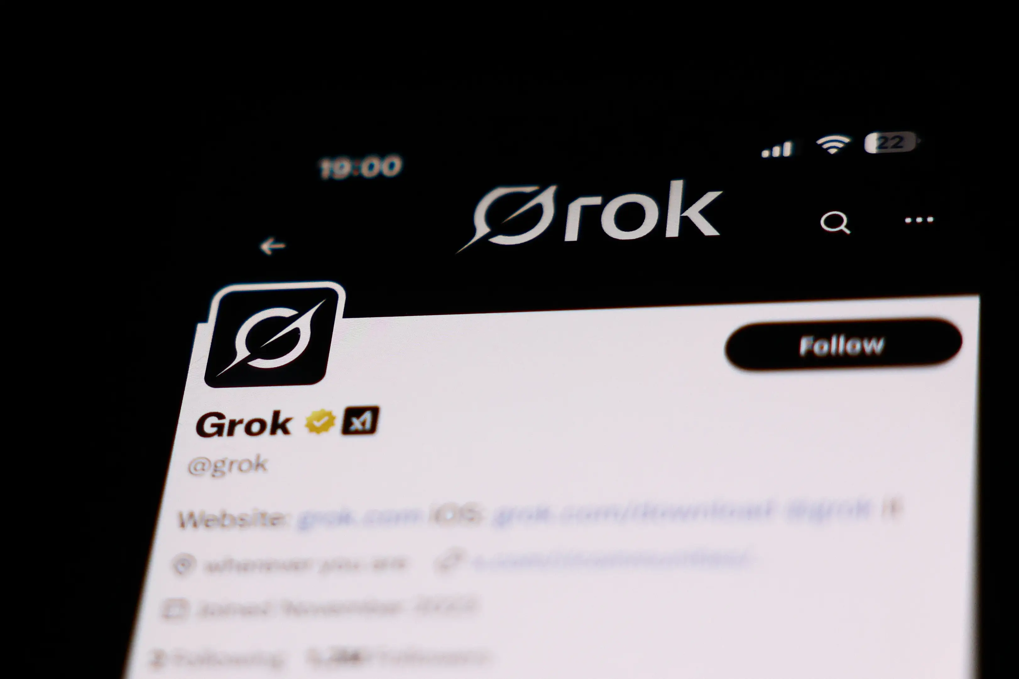 Grok is Elon Musk's AI which you can use on X, and people have been using it to create explicit images of people without their consent (Jakub Porzycki/NurPhoto via Getty Images)