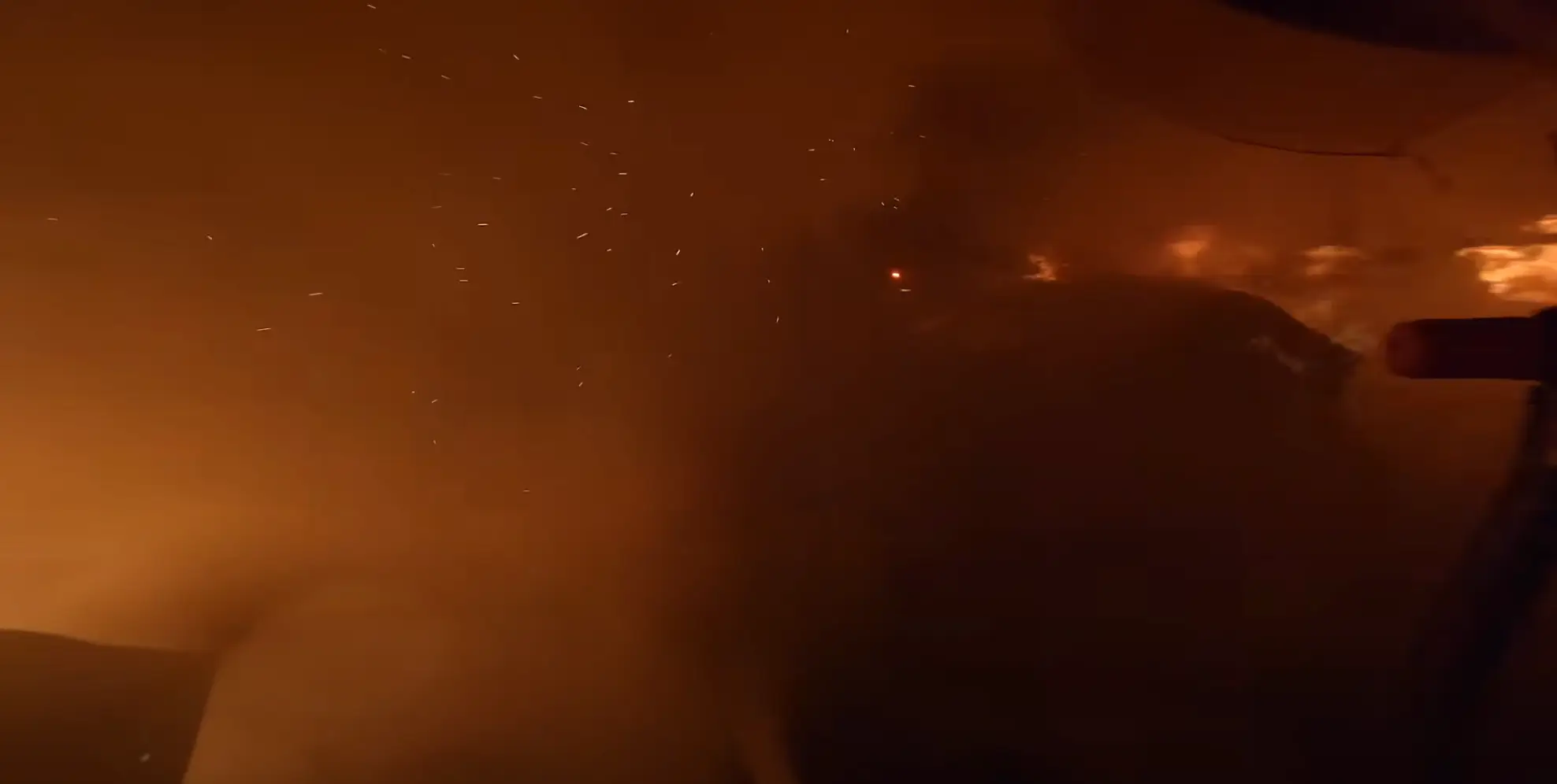 Espinoza did his best to put as much of the fire out as possible (YouTube/GoPro)