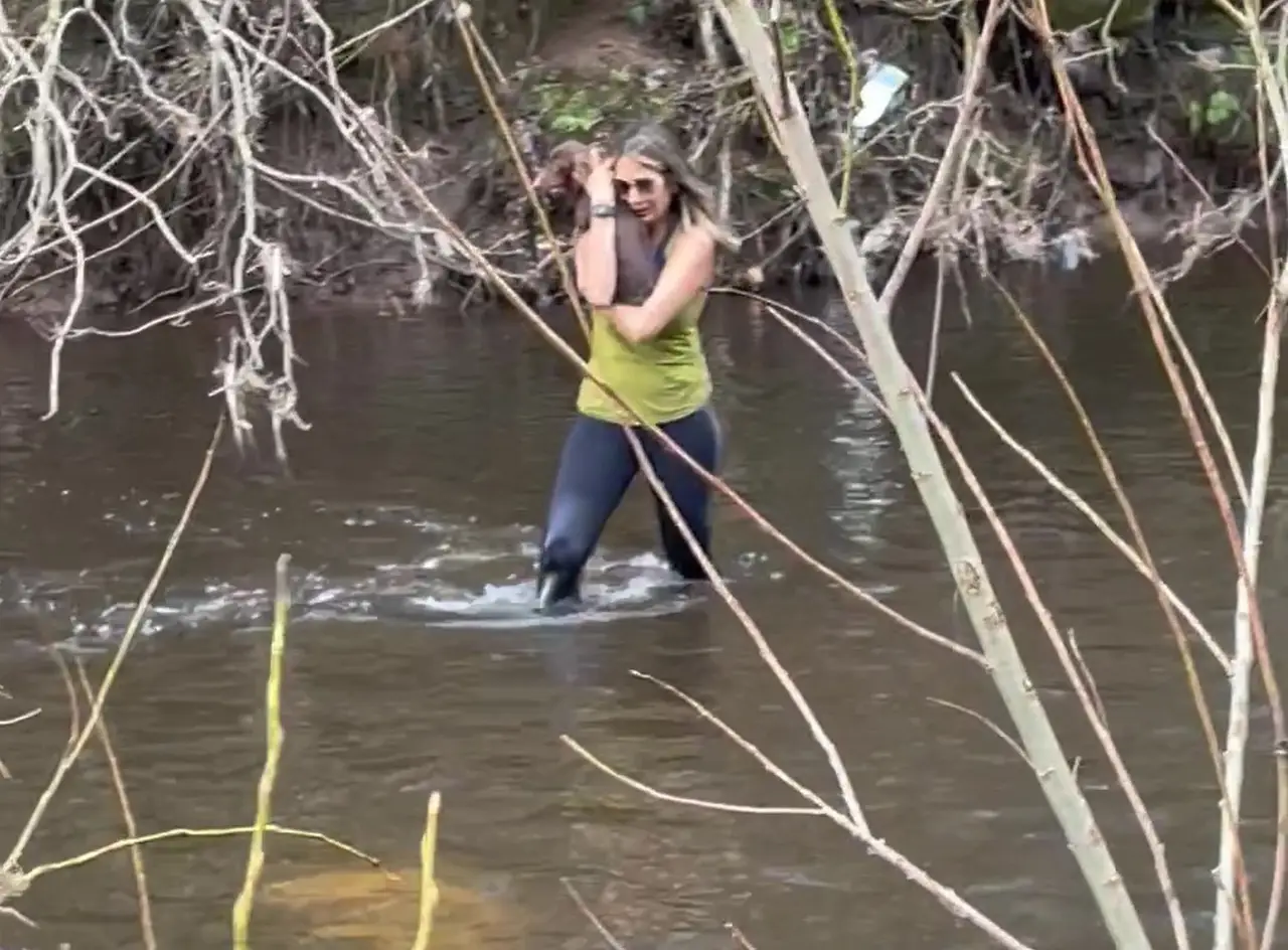 The relieved pet owner with her missing dog.