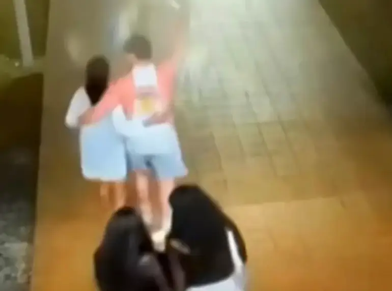 Her and Riibe were seen strolling together as the group headed to the beach in CCTV footage (11Alive)