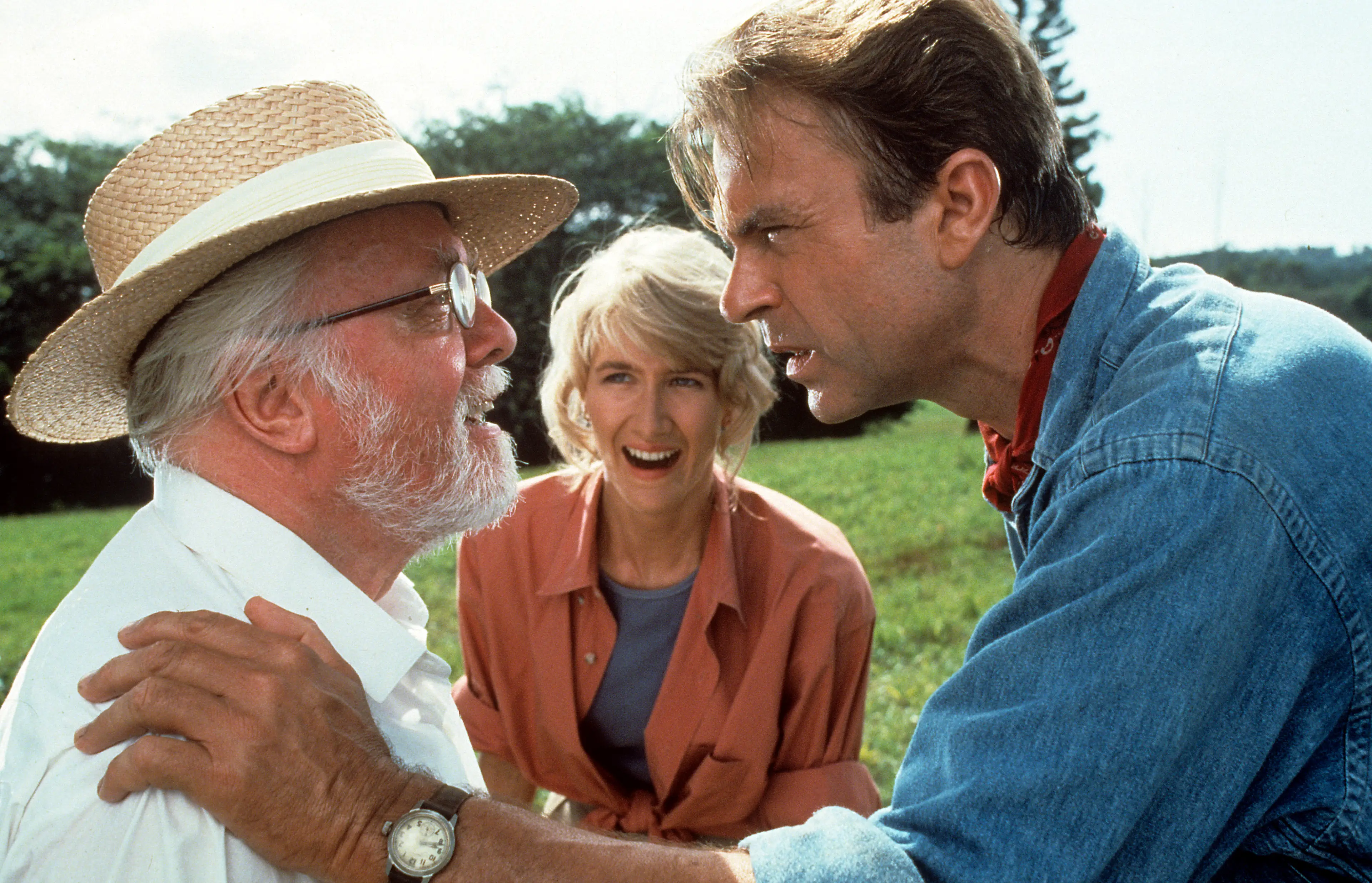 Richard Attenborough, Laura Dern and Neill in the legendary 1993 film Jurassic Park (Universal/Getty Images)