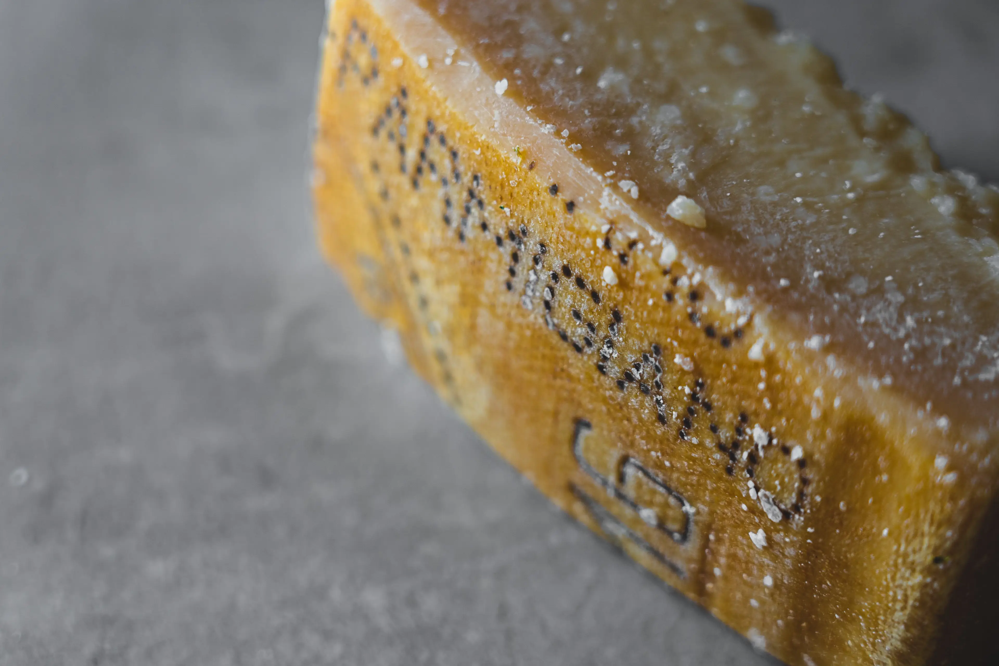 Parmesan contains Rennet - an enzyme found in the stomach lining of goats and calves.