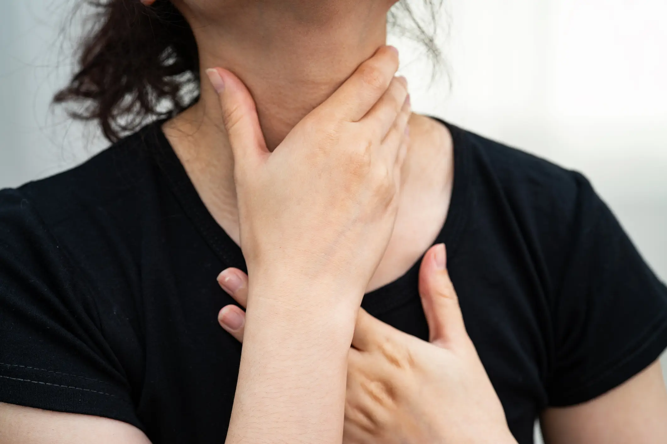 Common symptoms of throat cancer include a sore throat which doesn't go away and a lump in the neck (Getty Stock Images)