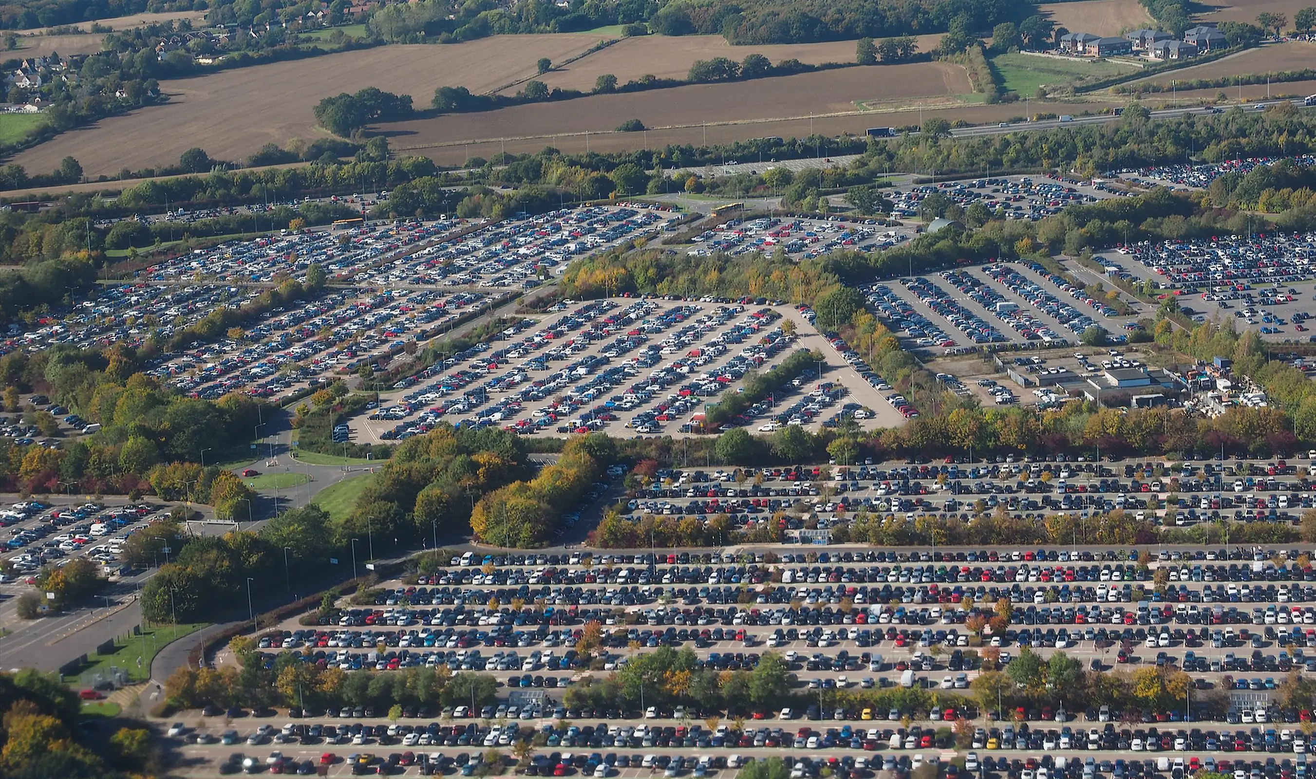 A whole load of cars parked up at London Stansted Airport (Getty Stock Images)