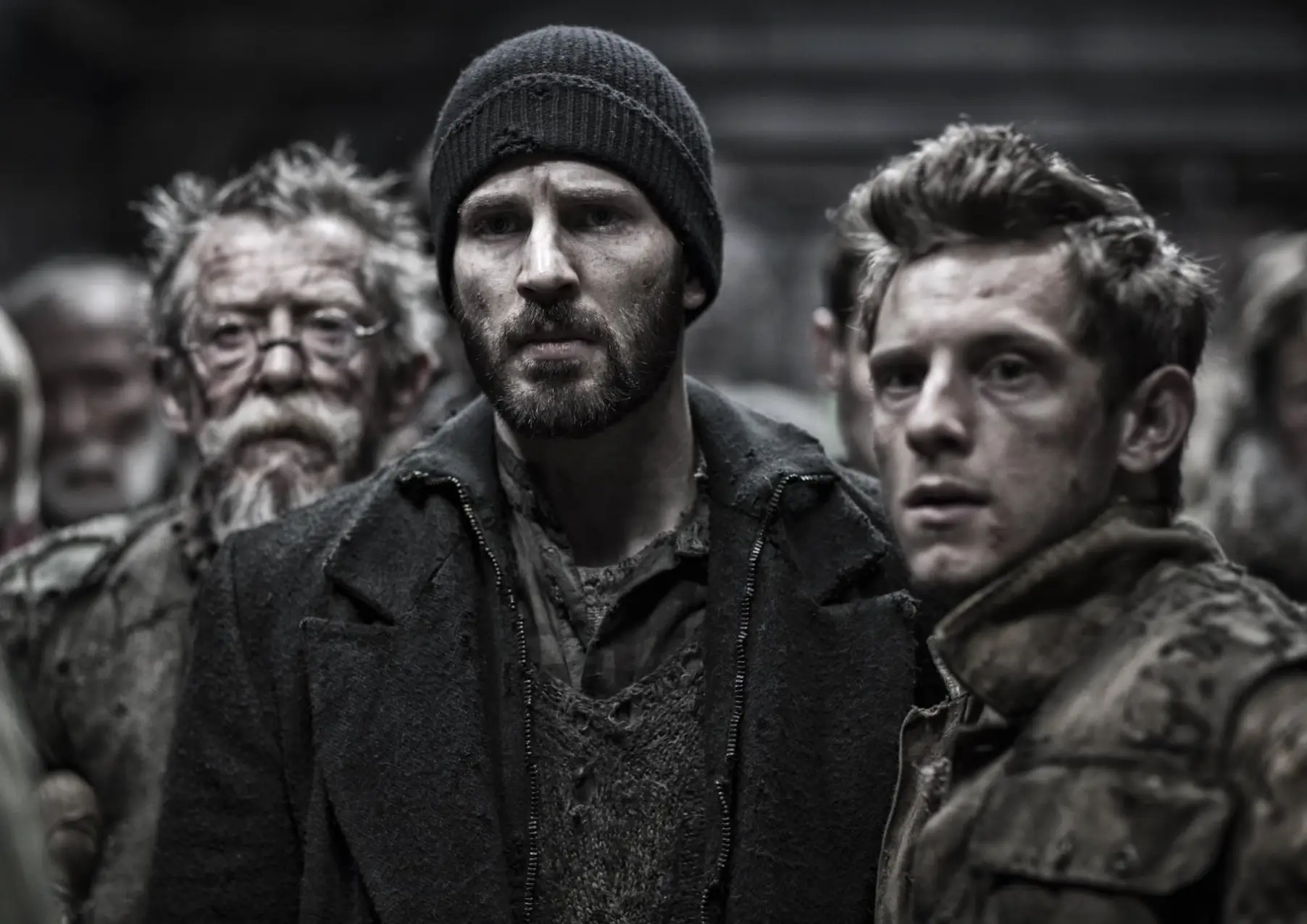 L-R: Chris Evans, John Hurt and Jamie Bell in the sci-fi film.