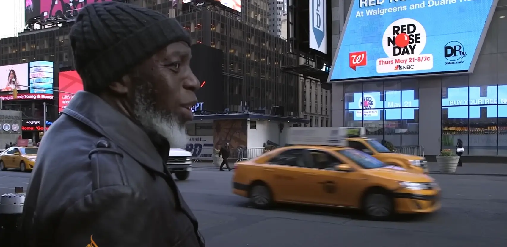 Otis Johnson was left mesmerised by the billboards in Times Square (YouTube/Al Jazeera)
