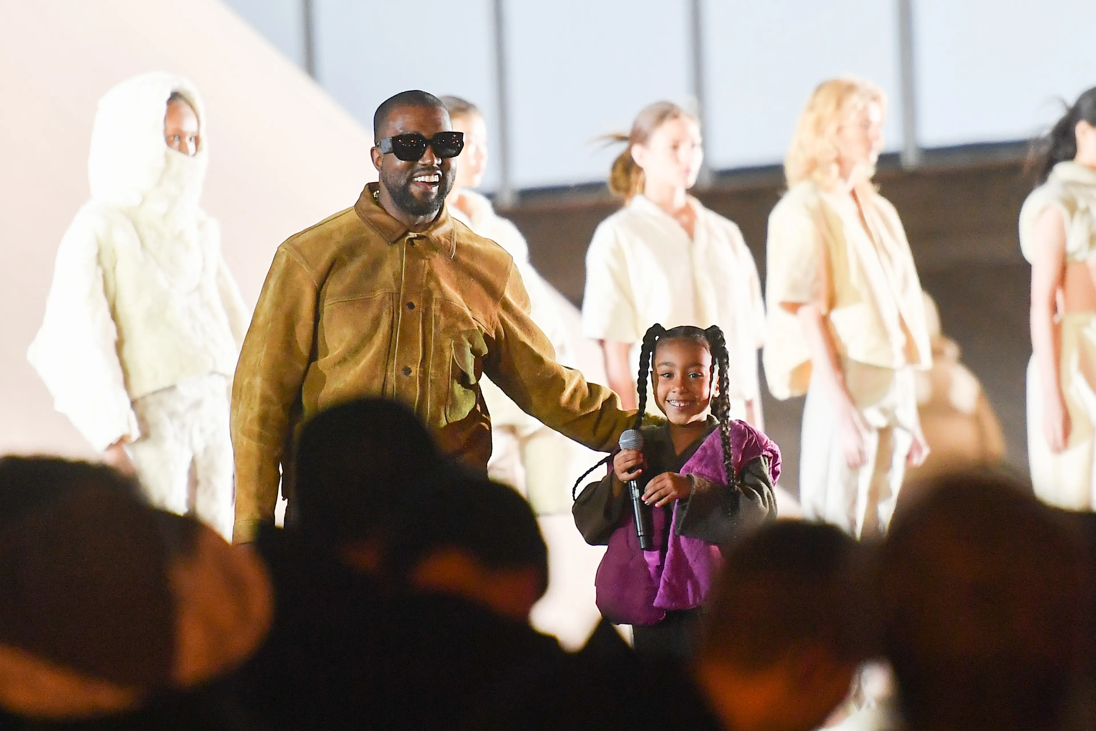 The teenager seen on stage with her dad Kanye at Paris Fashion Week in 2020 (Stephane Cardinale - Corbis/Corbis via Getty Images)