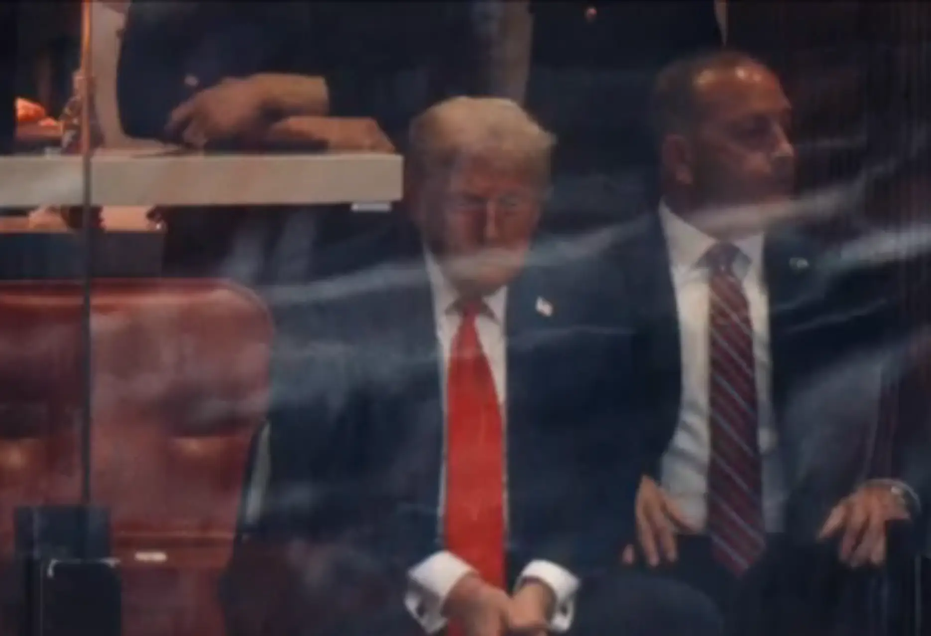 Trump chose to wear a red tie in accordance with the service's dress code (Rumble/The Charlie Kirk Show)