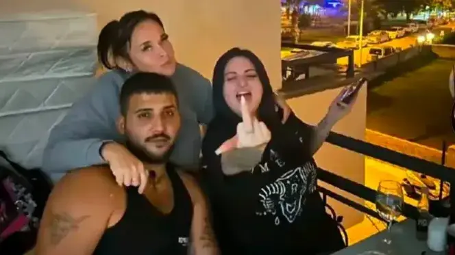 Courtney Gartshore (centre) was pictured abroad on holiday while she was on bail and awaiting trial for killing her infant daughter (Social Media)