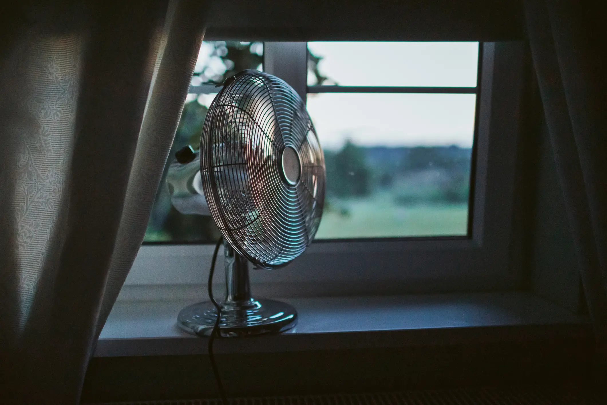 A sleep expert has warned against using a fan all night (Getty Images/Rike_)