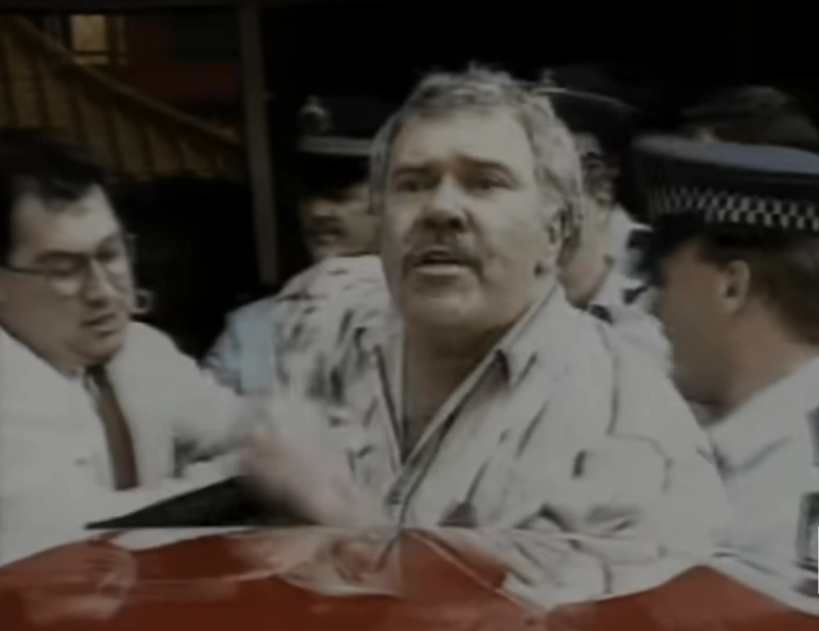 The bloke made sure his voice was heard before he got bundled into the back of a cop car.