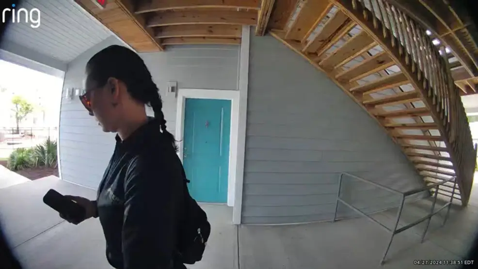 Mica seen leaving her home at 11:38am on 27 April, 2014 (Robeson County Sheriff's Office)