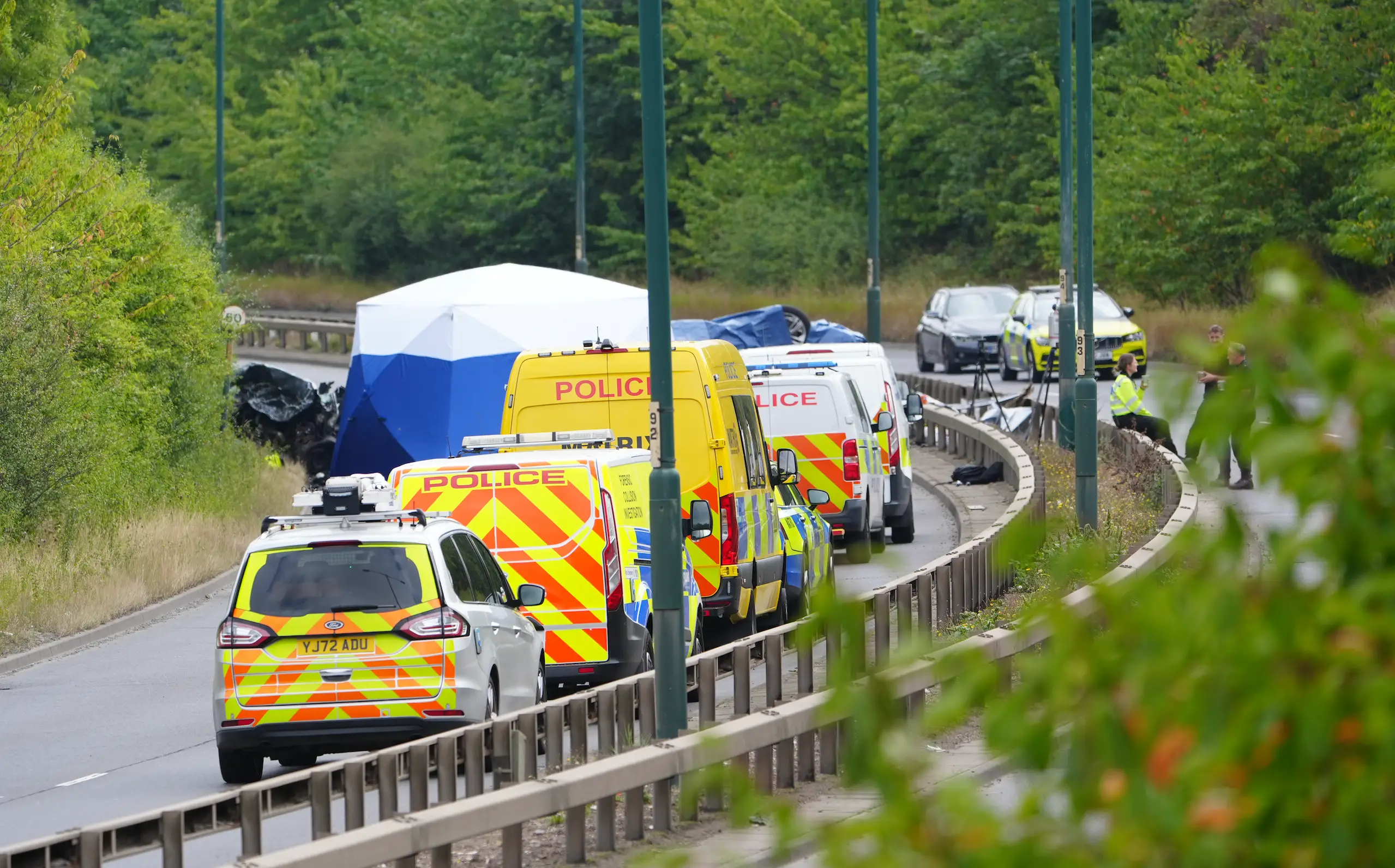 Police officers on the scene of the crash near Middlesbrough (Owen Humphreys/PA Wire)
