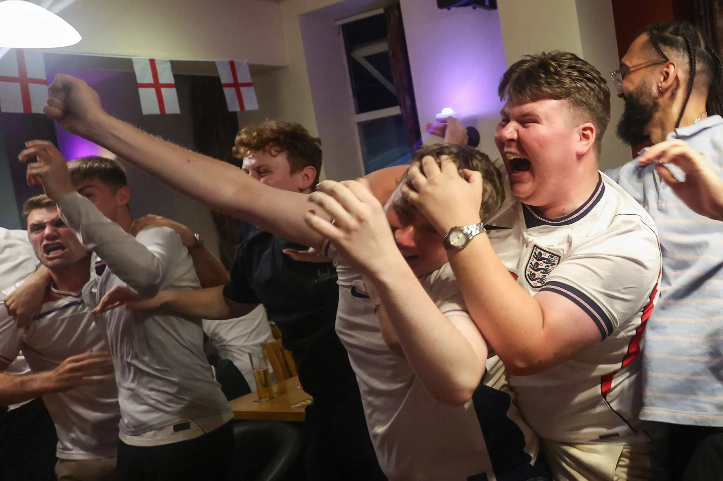 The game was worth staying up for and plenty of folks did (SCOTT HEPPELL / AFP via Getty Images)