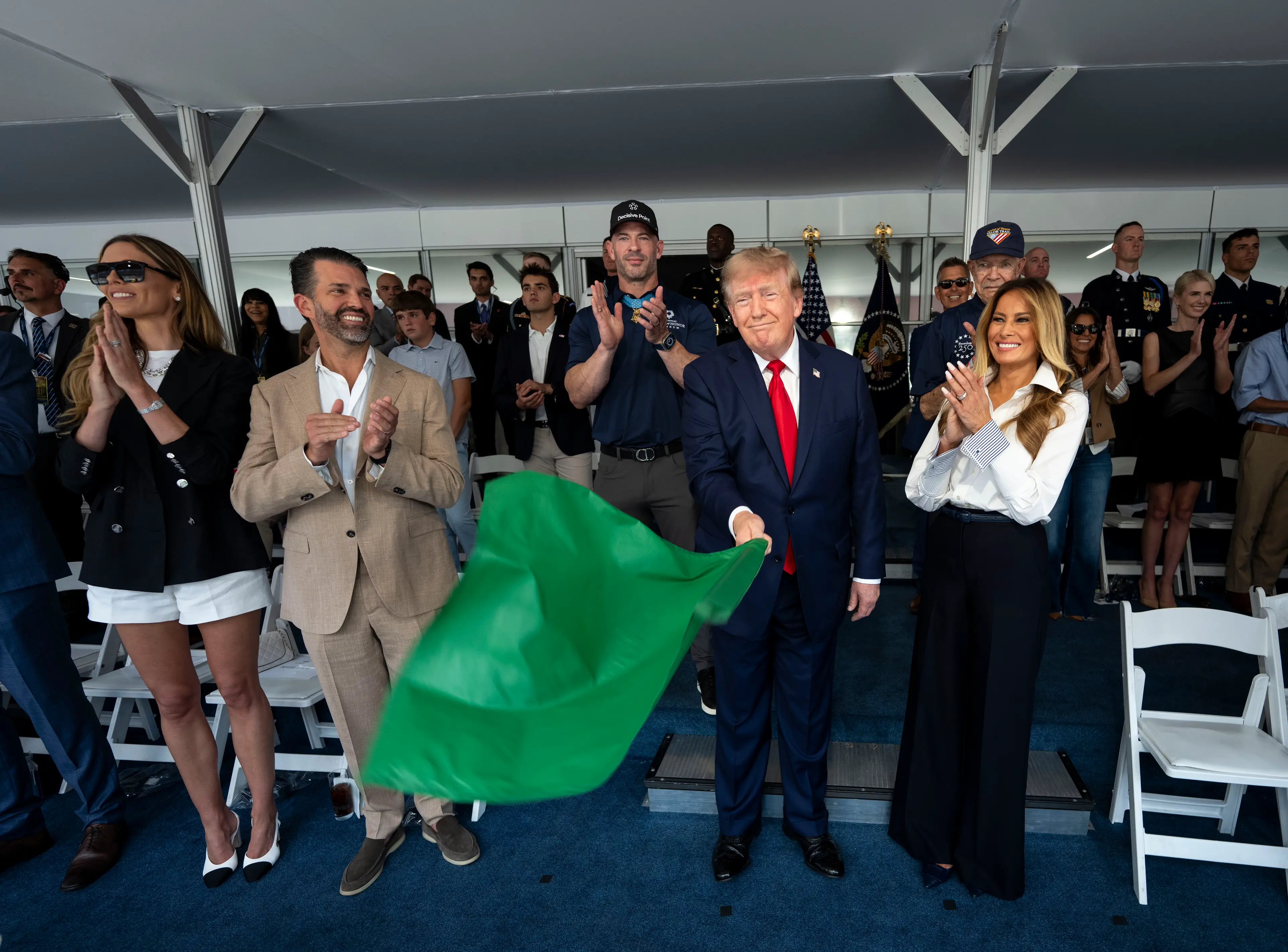 Donald and Melania were all smiles as the race started (Doug Mills - Pool/Getty Images)